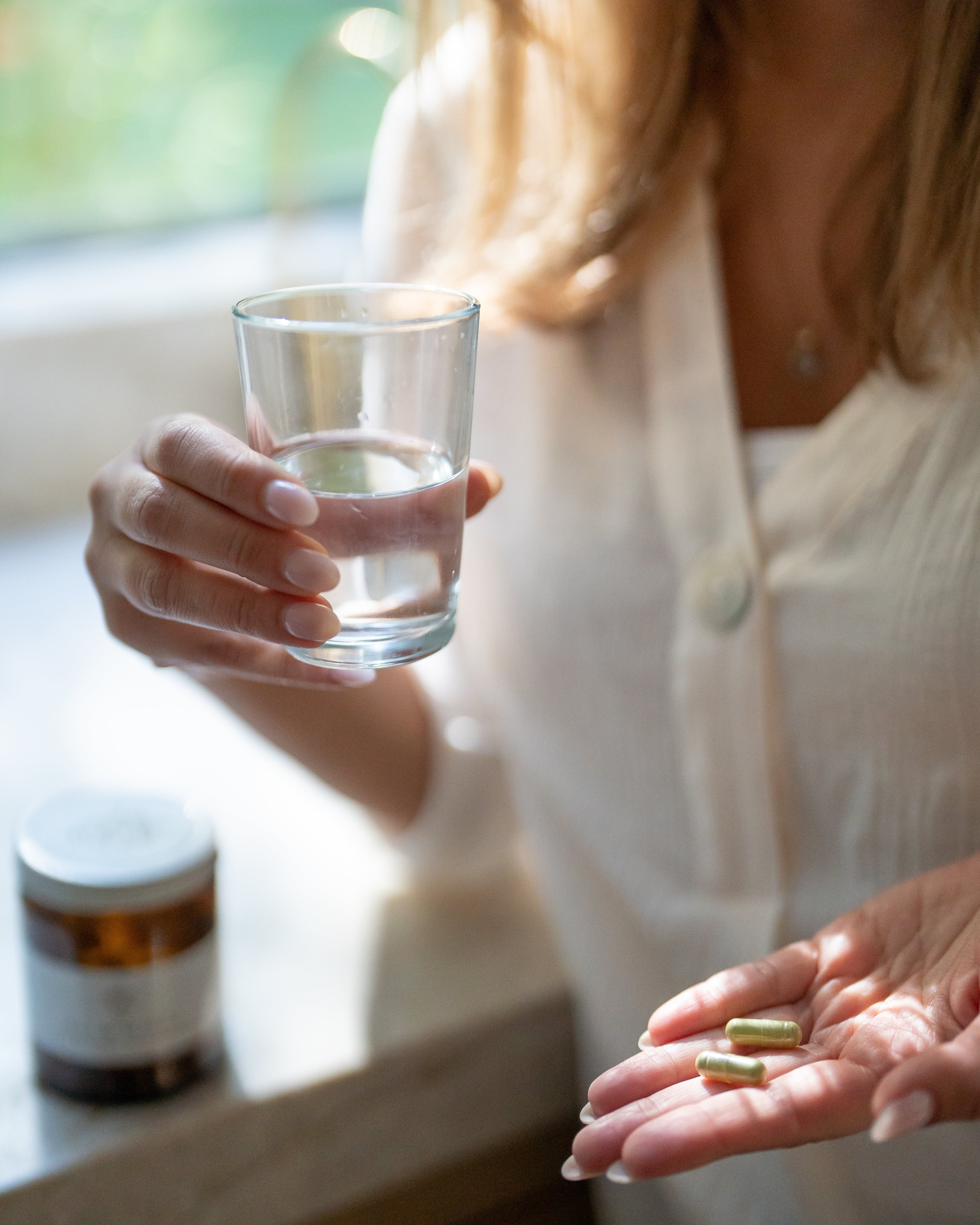 Moringa capsules used with glass of water
