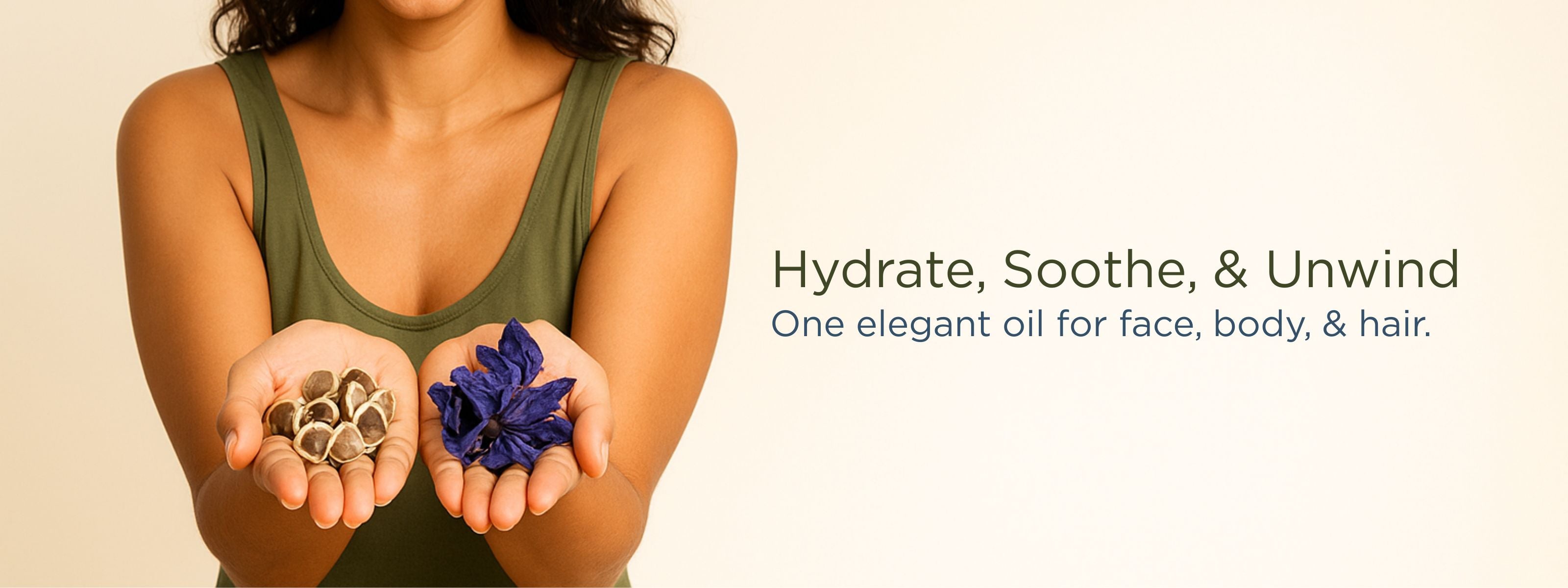 woman facing the camera holds moringa seeds in one hand and dried blue lotus flowers in the