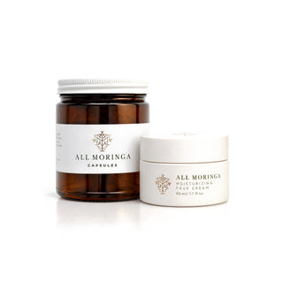 Moringa Face Cream & Leaf Capsules Duo: moringa leaf capsules jar and moisturizing face cream 50 ml on white