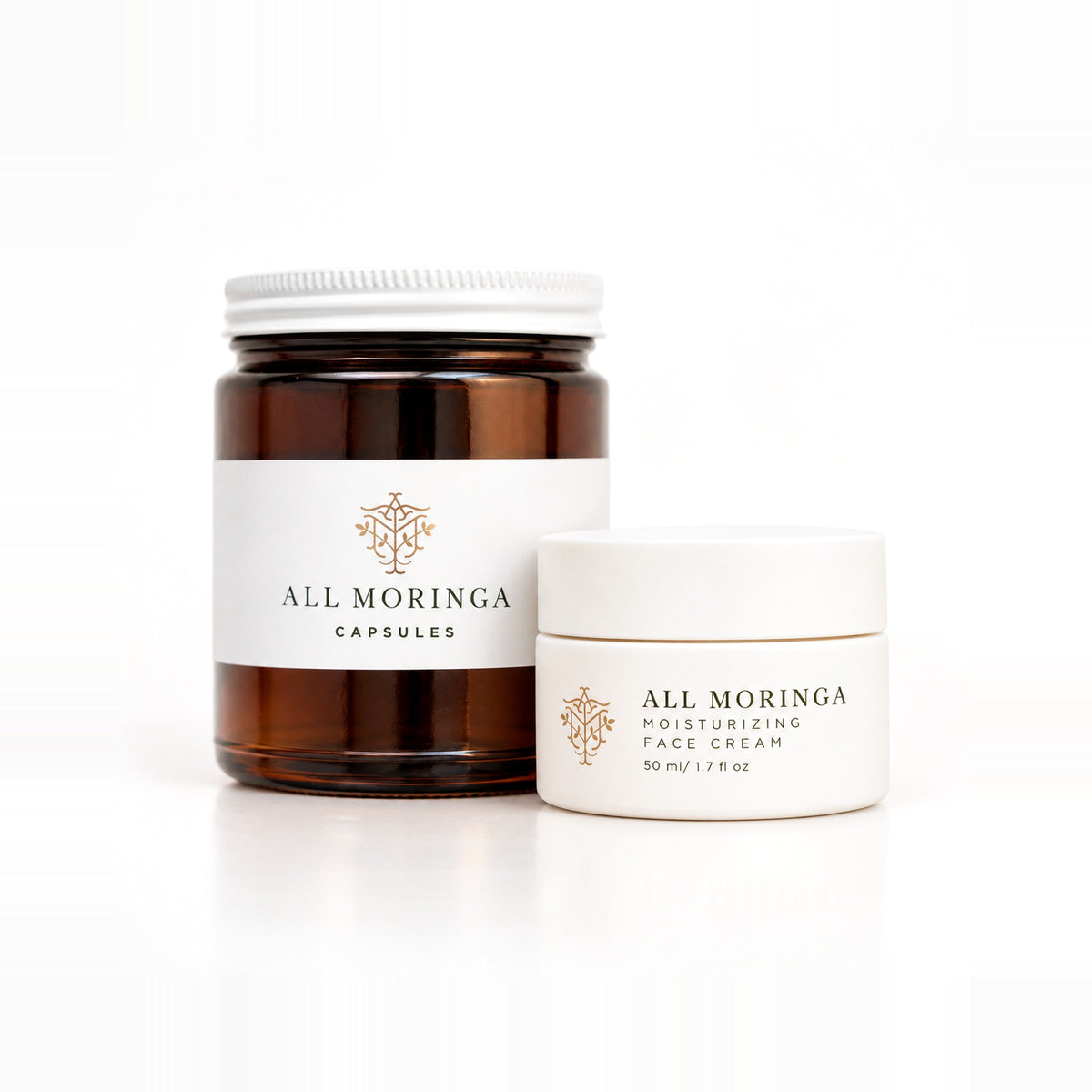 Moringa Face Cream & Leaf Capsules Duo: moringa leaf capsules jar and moisturizing face cream 50 ml on white