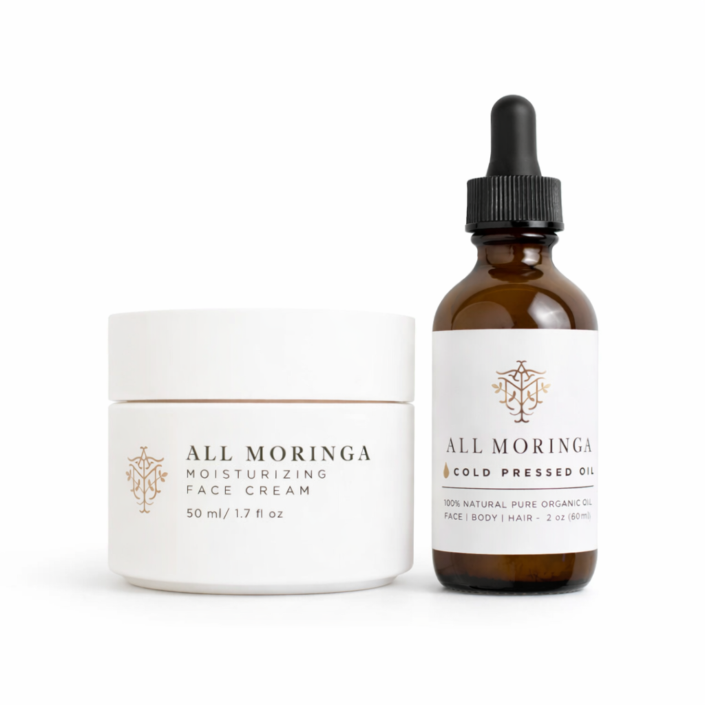 All Moringa moisturizing face cream and cold pressed oil on a white background
