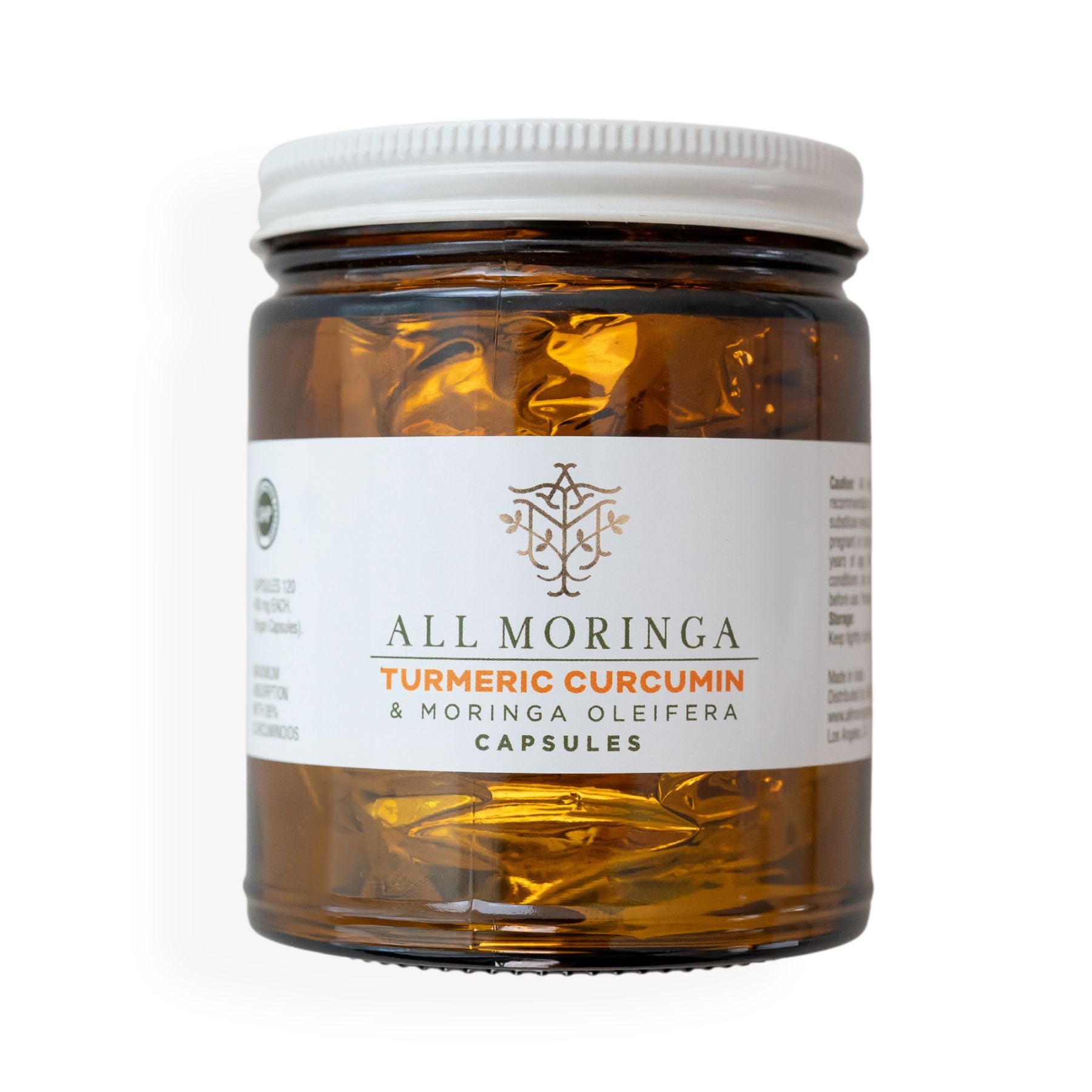 moringa leaves and turmeric rot in a glass jar turmeric curcumin root and moringa oleifera leaf capsules